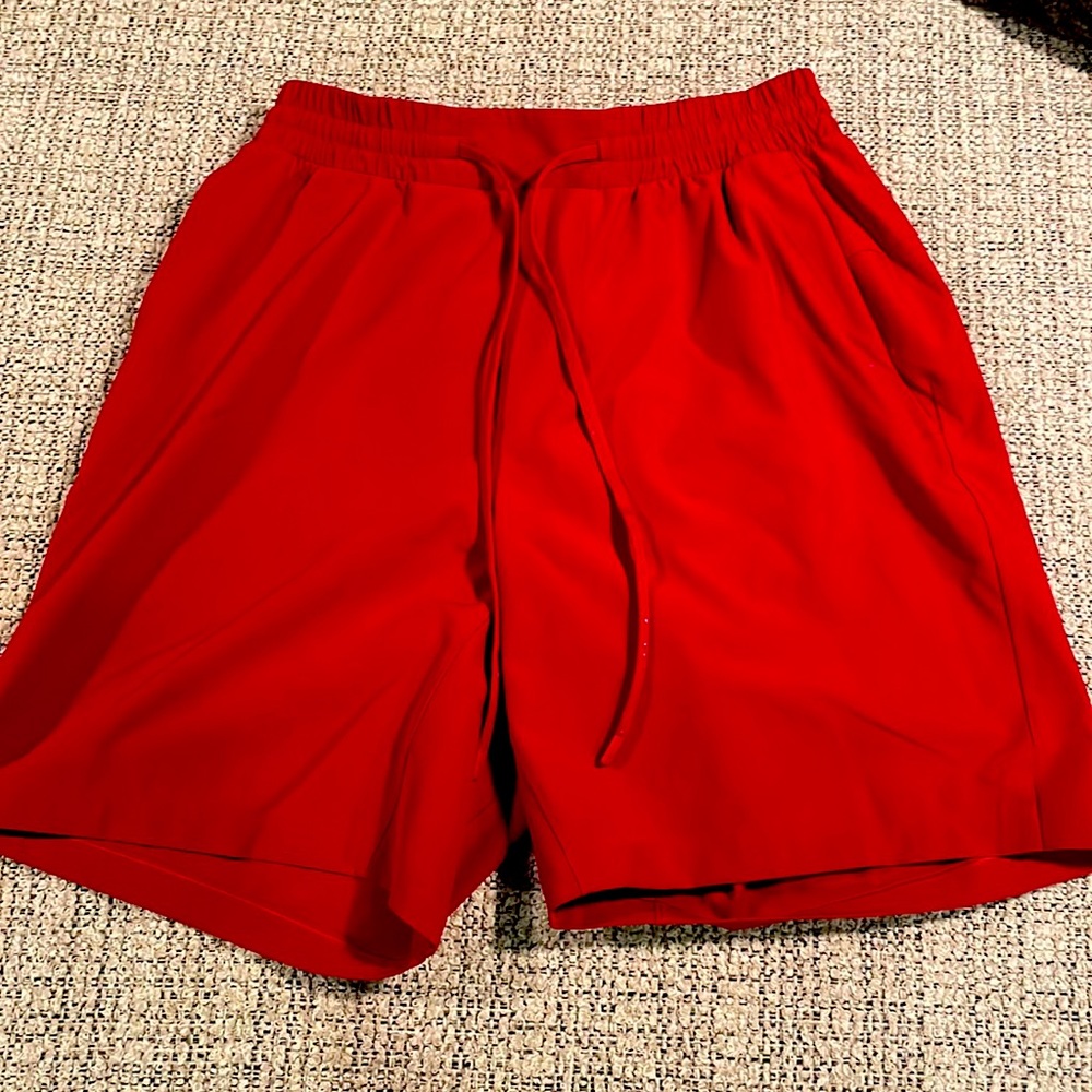Red Lululemon swim trunks